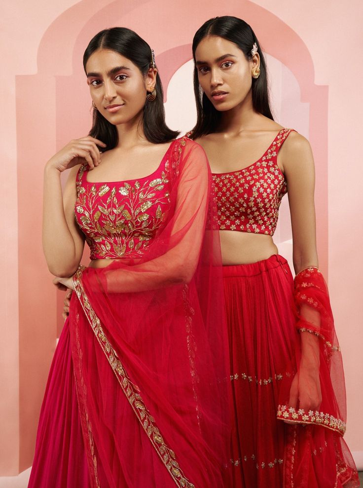 Editor's Note A Lehenga Set With Heavy Salli Jalli Blouse And A Half Kali Salli Lehenga With Border Dupatta. Fabric: Crepe And Net Color: Pink Care: Dry Clean Only About the Designer Ease is a minimalistic label based in Mumbai. For sisters Khushboo and Vidhi, it is a unique labor of love that amalgamates various elements of traditional Indian style with western silhouettes. Ease endeavor is to provide maximum comfort without comprising on sophistication and style. Navratri Reception Set With Traditional Drape, Transitional Anarkali Choli, Traditional Drape Sets For Reception And Navratri, Sharara With Unstitched Blouse In Chanderi, Sets With Dupatta For Reception During Navratri, Transitional Season Embroidered Palazzo Set For Reception, Festive Sharara With Cutdana For Reception, Navratri Sets With Intricate Embroidery In Floor-length, Festive Cutdana Sharara For Reception