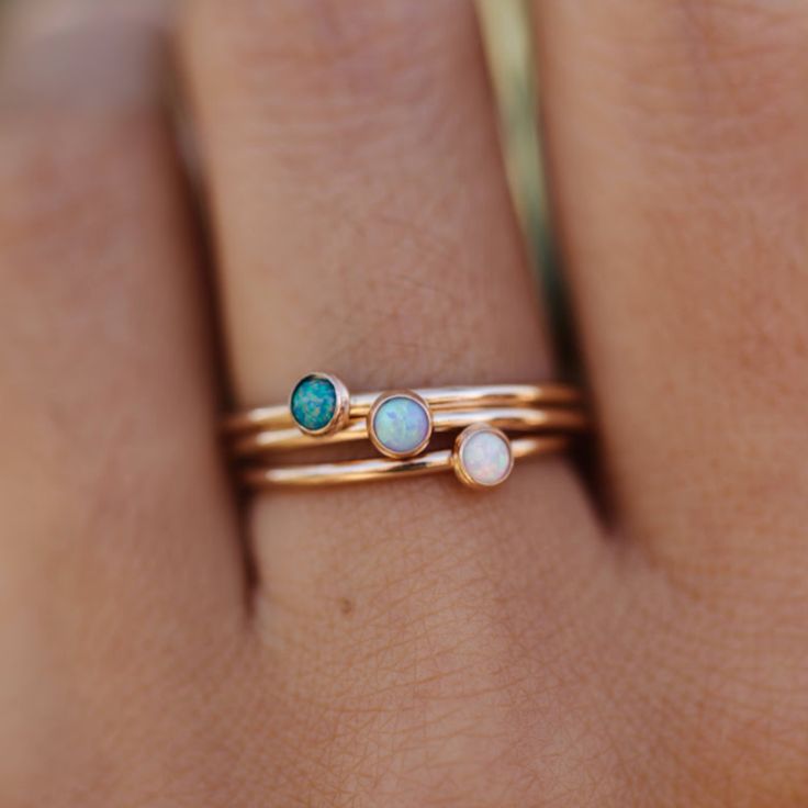 Dainty band with 3 different opal stone options. Looking for something a little bigger? Shop the 5mm stone here. Minimalist Adjustable Opal Ring, Adjustable Opal Ring With Round Stone, Elegant Adjustable Opal Stackable Rings, Dainty Tiny Opal Jewelry, Tiny Dainty Opal Jewelry, Minimalist Opal Stackable Promise Rings, Adjustable Opal Birthstone Jewelry, Minimalist Stackable Opal Ring, Minimalist Adjustable Opal Ring For Anniversary