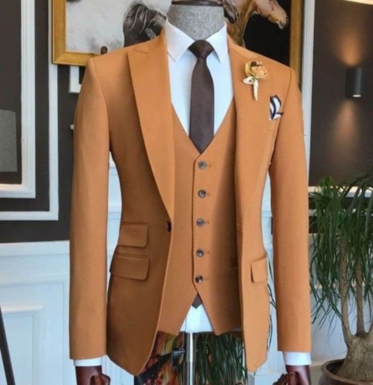 "This is a Classic 3 Piece Suit by Golden Attire crafted from high quality fabric and imported materials. Our products are handcrafted by experienced tailors who make sure the that the stitching is precise, lining is proper and the overall product is sturdy enough to not go out of shape for more than a few years. Also all our products have extra margins in their length, sleeves, sides so it's easily alterable if your size changes after some time. To see more available colours and designs in this collection, Check out the 'Classic Two Piece Suits' Section. *This is a 3 piece set  and a trouser. *We also offer customization so we can provide you an even better fit if you massage us your measurements (in inches) of Chest, Stomach, Waist, Hip, Shoulder and Actual Height after ordering. *Want t Groom Suit Sets With Suit Collar And Buttons, Fitted Three-piece Suit For Groom, Fitted Wedding Suit Set, Brown Three-piece Wedding Suit, Brown Three-piece Suit With Notch Lapel For Wedding, Fitted Brown Double Breasted Suit For Groom, Brown Notch Lapel Three-piece Suit For Wedding, Single Breasted Wedding Suit Sets, Single Breasted Suiting Fabric Sets For Wedding