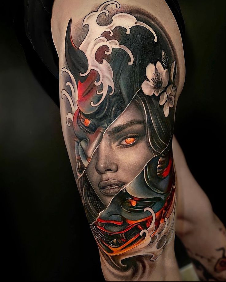 a woman's arm with an artistic tattoo on it