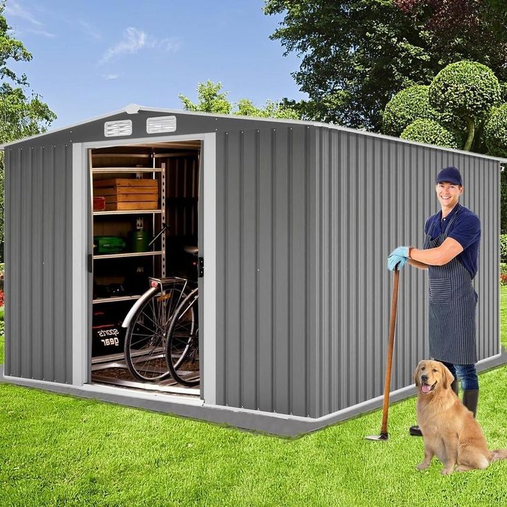 a man standing next to a dog in front of a shed with a bicycle inside