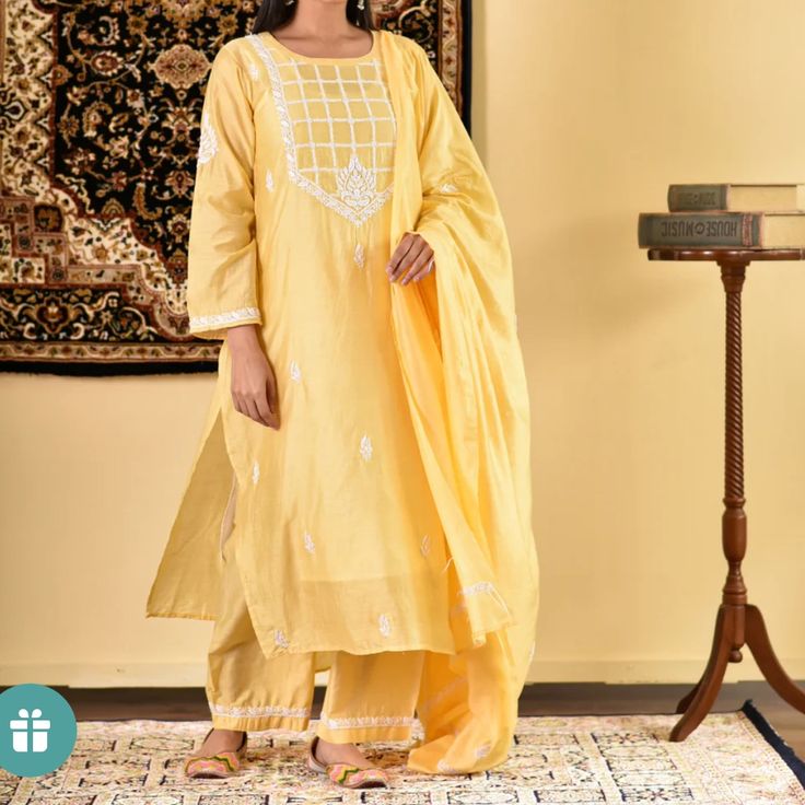 Straight-Fit Kurta Set In Luxe Chanderi Hand-Embroidered With Chikankari Work Comes With An Inner Yellow Mulmul Anarkali Set With Straight Kurta, Yellow Mulmul Sharara With Dupatta, Yellow Traditional Wear With Dupatta In Mulmul, Yellow Mulmul Traditional Wear With Dupatta, Unstitched Yellow Mulmul Sharara, Yellow Mulmul Palazzo Set With Dabka Work, Yellow Unstitched Mulmul Sharara, Yellow Palazzo Set With Dabka Work In Mulmul, Yellow Mulmul Sharara With Dabka Work