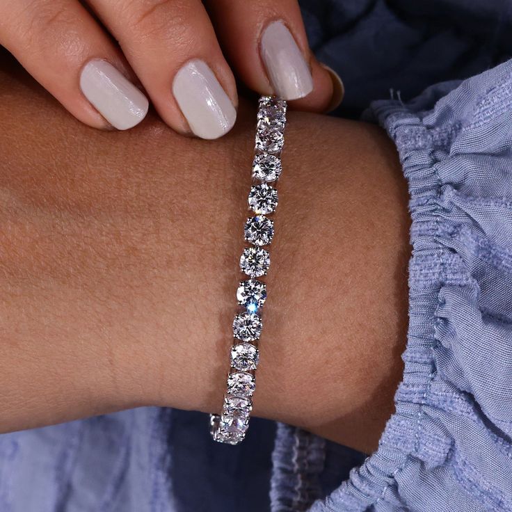 round diamond tennis bracelet Diamond Bangles, Diamond City, Diamond Tennis Bracelet, Man Made Diamonds, Diamond Bangle, Tennis Bracelet Diamond, Engraved Jewelry, Metal Band, Bracelet For Women