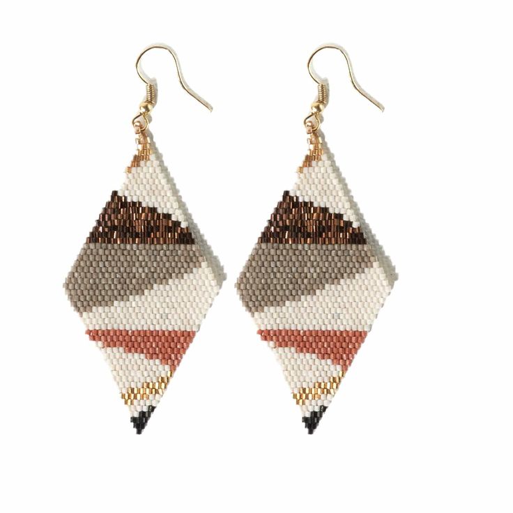 a pair of beaded earrings with different colors and designs on them, hanging from gold hooks