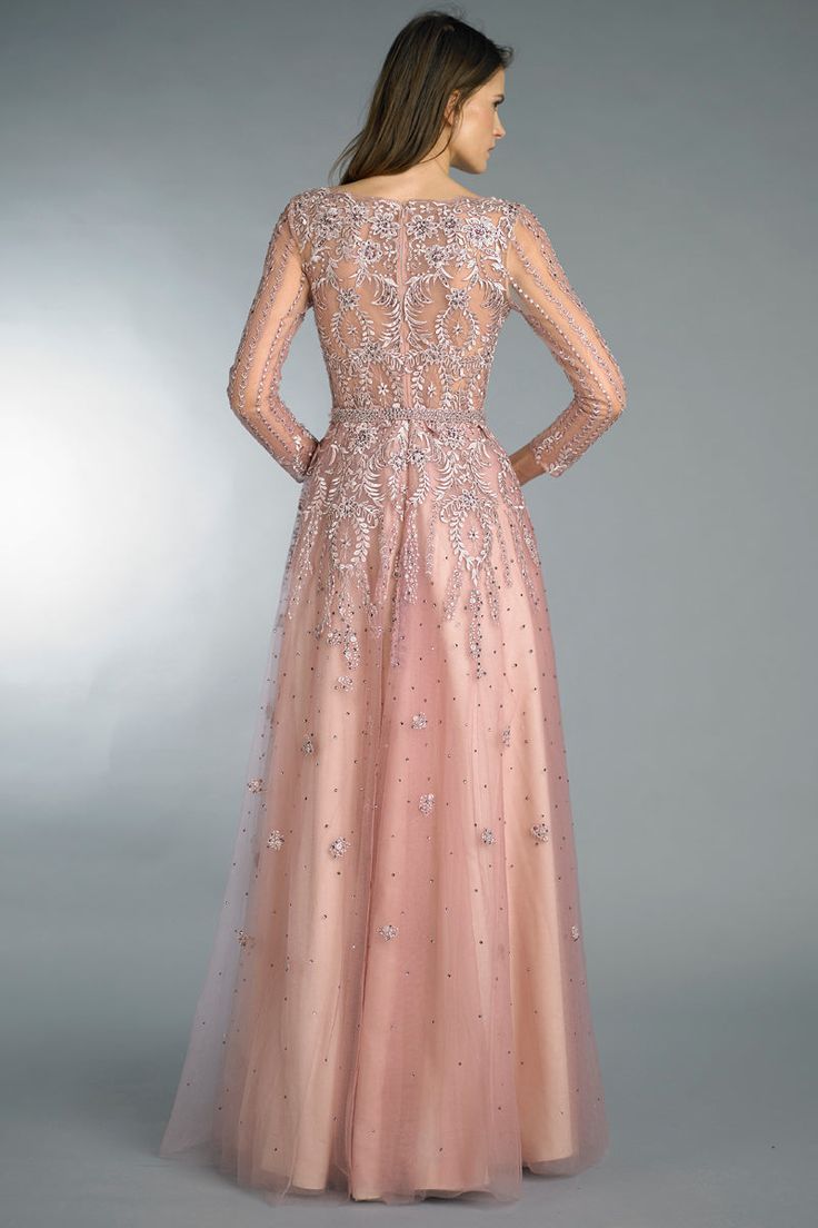 Although discontinued from Basix Black Label line, this mauve long sleeve beaded gown is perfect for an early spring or fall wedding. It features embroidery with sporadic beading for a glamorous look. Color: Mauve. Please note: This listing is for our sample dress only. This dress has been tried on in our Newtown, CT shop but has never been worn to an event or altered in any way. As with many samples, there may be small imperfections on this dress such as loose beading but an alterations person/ Long Sleeve Evening Dress With Sheer Fitted Bodice, Fitted Long Sleeve Embellished Gown, Long Sleeve Evening Dress With Sheer Bodice For Prom, Long Sleeve Gown With Sheer Bodice For Prom, Embellished Evening Dress With Fitted Bodice And Long Sleeves, Long Sleeve Embellished Evening Dress With Fitted Bodice, Pink Long Sleeve Mother Of The Bride Dress, Glamorous Long Sleeve Hand Embellished Dress, Long Sleeve Prom Gown With Sheer Bodice