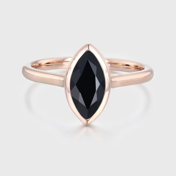 Discover sleek elegance with our Bezel Set Marquise Cut Black Onyx Ring in 14K Rose Gold, a symbol of style and sophistication. Bezel Set Marquise, Black Onyx Engagement Ring, Black Onyx Ring, Onyx Ring, Affordable Jewelry, Marquise Cut, Lab Diamonds, Bezel Setting, Gift For Women