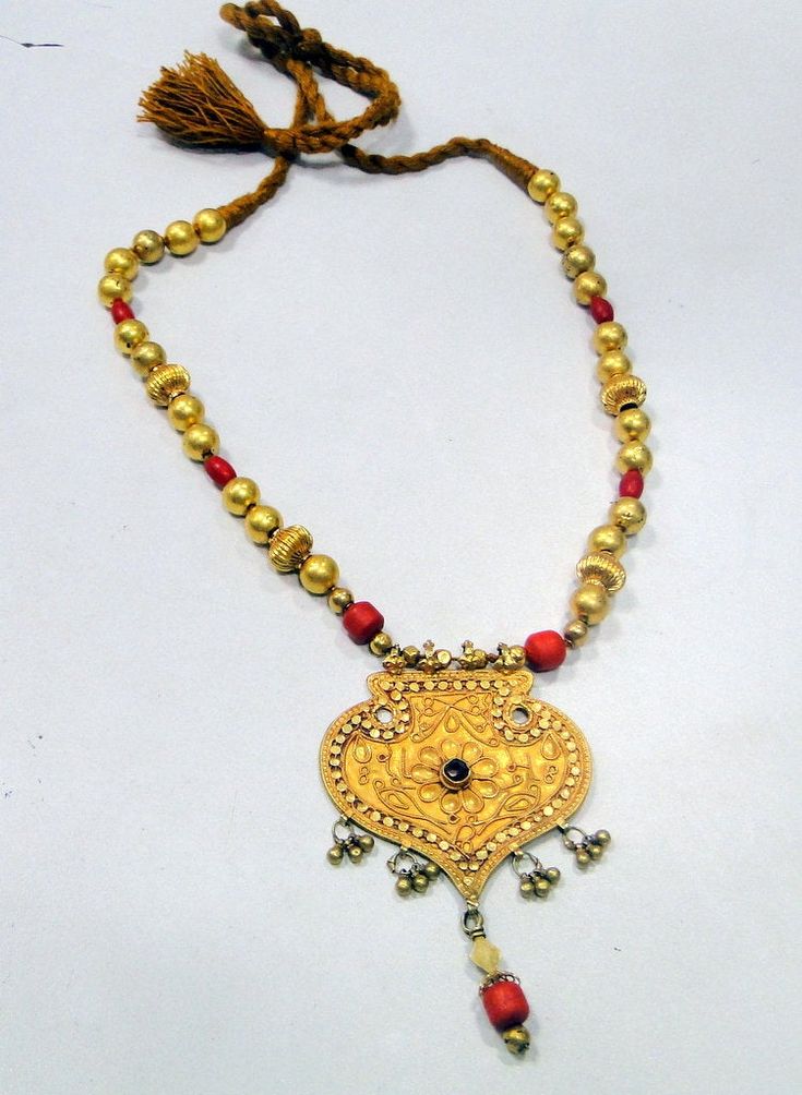 "Vintage antique tribal old solid gold and red color touchstones beads necklace. Fully handmade collection piece in good condition. Length-32 cm(12.6\") free size, easy to adjust the length by moving toggle. Size of pendant-9/6 cm, weight-62.350 grams." Traditional Pendant Beaded Necklaces For Festivals, Traditional Ceremonial Pendant Beaded Necklaces, Traditional Ceremonial Beaded Pendant Necklaces, Traditional Ceremonial Beaded Pendant Necklace, Handmade Traditional Temple Necklace For Festivals, Traditional Handmade Temple Necklace For Festivals, Gold Kundan Beaded Necklaces For Ceremonies, Temple Jewelry Handmade Beaded Necklaces For Rituals, Traditional Large Beads Necklaces For Rituals