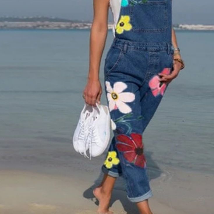 Denim Overalls By Miss Look Boutiques. Oversized Carpenter Style Wear. Ajustable Shoulder Straps. Painted Daisy Floral Pattern. Retails $65-$195. Light Blue Shown For Fit Only. New!! In Packaging $$-- Is For One Pair Only. Color Choice Variety?? Dark Blue Or Pink?? Small Sizing. See Above Chart For Measure. Casual Floral Print Overalls For Spring, Casual Medium Wash Floral Print Bottoms, Casual Denim Blue Floral Print Jeans, Casual Floral Print Denim Blue Jeans, Casual Denim Bottoms With Floral Print, Spring Medium Wash Overalls, Casual Multicolor Overalls For Spring, Summer Floral Print Denim Pants, Pink Denim Jeans For Spring