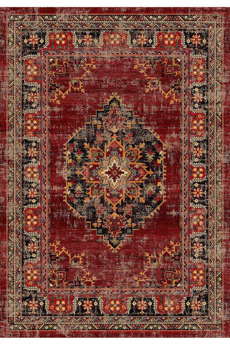 a red rug with an ornate design on the middle and bottom, surrounded by other decorative elements