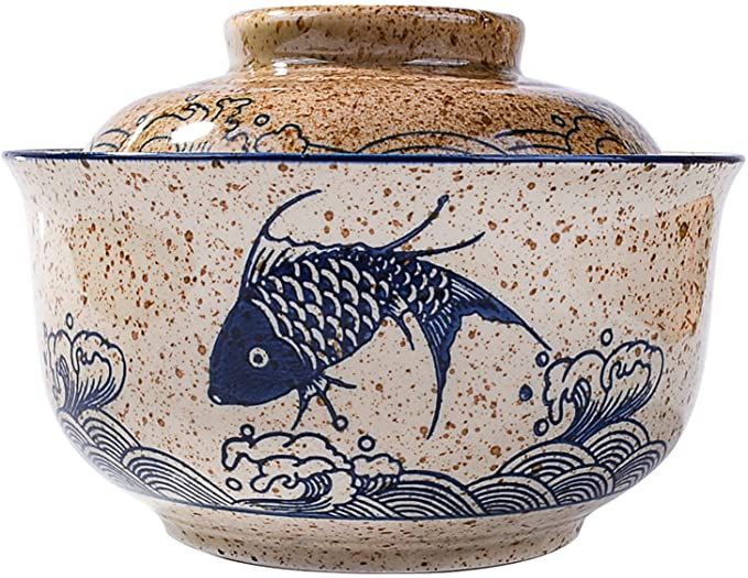 a ceramic bowl with a fish on it