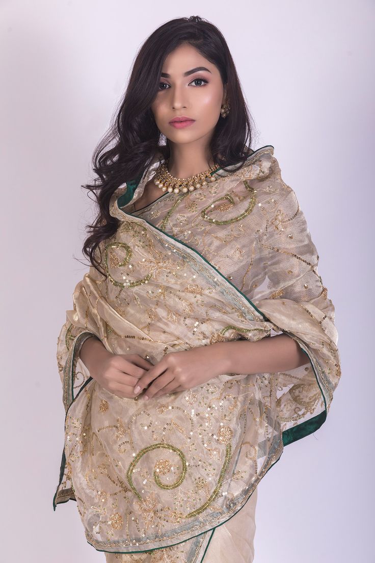 Beige tissue saree with intricate zardosi, sequins and aari handwork embroidery. Comes with blouse.
Components:2
Embroidered
Fabric:Tissue, Crepe
Color:Gold, Beige
Handwork embroidery - Aza Fashions Gold Organza Pre-draped Saree With Resham Embroidery, Festive Bollywood Pre-draped Tussar Silk Saree, Festival Organza Pre-draped Saree With Mirror Work, Bollywood Style Embroidered Chanderi Pre-draped Saree, Traditional Pre-draped Organza Saree With Mirror Work, Bollywood Style Art Silk Pre-draped Saree With Sheer Dupatta, Festive Chanderi Pre-draped Saree With Zari Work, Raw Silk Salwar Kameez With Dupatta For Reception, Eid Designer Wear Embroidered Tissue Silk Fabric