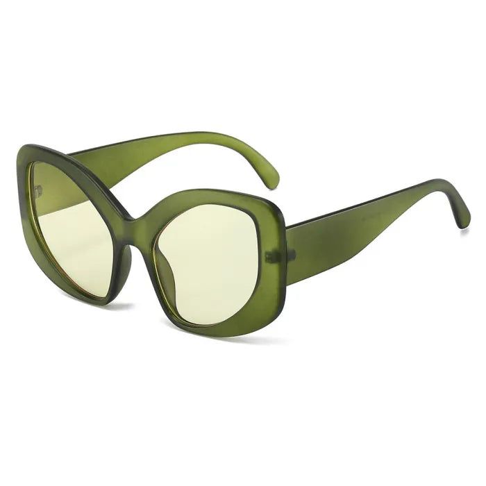 Rock a retro look with these Y2K Oversized Oval Cat Eye Sunglasses in trendy green. Oversized lenses provide UV protection and widen your field of vision, while the cat eye design adds a playful touch. Perfect for those who embrace a quirky style! Retro Green Plastic Sunglasses, Green Cat Eye Sunglasses For Summer, Retro Green Polarized Sunglasses, Trendy Green Polarized Cat Eye Sunglasses, Retro Green Sunglasses With Gradient Lenses, Green Plastic Sunglasses With Uv Protection, Modern Green Cat Eye Sunglasses With Gradient Lenses, Trendy Green Cat Eye Sunglasses With Mirrored Lenses, Trendy Green Sunglasses With Uva Protection