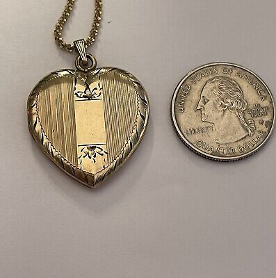 Vintage Mid Century Goldtone Engraved Heart Locket Photo Pendant Necklace 20” | eBay Vintage Round Pendant Jewelry With Heart Charm, Vintage Jewelry With Heart Charm And Round Pendant, Vintage Heart Charm Round Pendant Jewelry, Vintage Necklace With Heart Charm And Round Pendant, Vintage Necklace With Round Pendant And Hallmark, Vintage Hallmark Round Pendant Necklace, Vintage Necklace With Hallmark And Round Pendant, Collectible Yellow Gold Necklace With Heart Charm, Heart-shaped Etched Necklaces For Valentine's Day