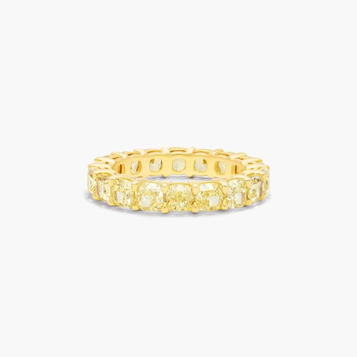 14K Yellow Gold Fancy Yellow Cushion Cut Diamond Eternity Ring. This fancy yellow cushion cut diamond eternity ring will make you stand out from the crowd. The bright yellow color of these diamonds are like sunrays in your fingers. Total carat weight will vary depending on finger size Yellow Diamond Band Ring, Yellow Diamond Eternity Band, Yellow Diamond Wedding Band, Diamond Infinity Band, Black Mamba Snake, Mamba Snake, Yellow Diamond Ring, Colored Diamond Jewelry, Yellow Cushion