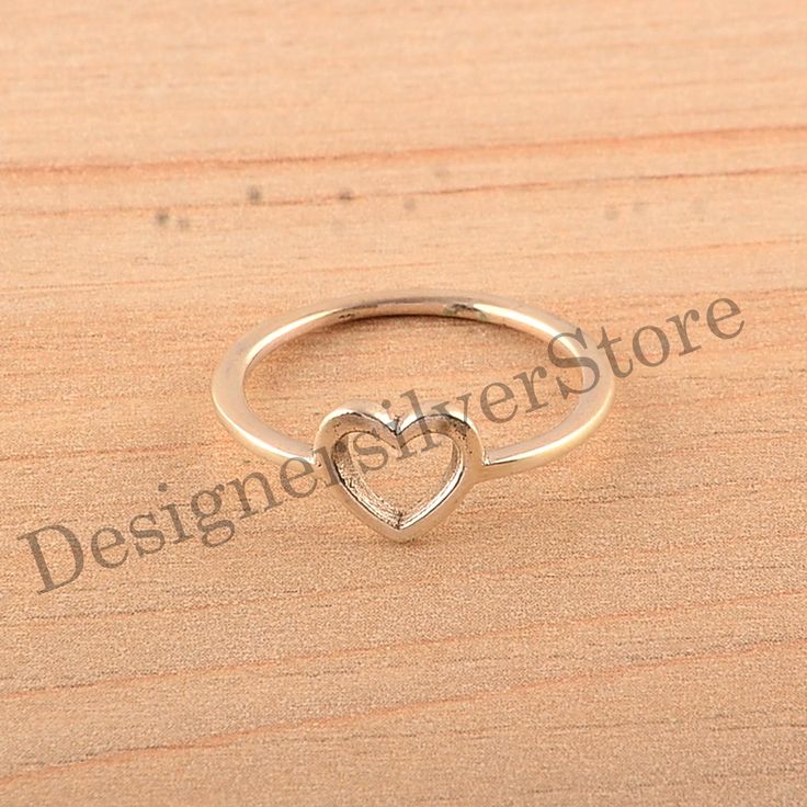 About item Item :- Heart Ring Ring size :- Chose from variation (Custom size accepted) Material  :- 925 Sterling silver Purity  :- 92.5 Title:- Love Heart Ring, Heart shaped ring, Heart Hand Rings, Open Heart Jewelry, Simple Heart Ring, Romantic Rings, Charming Ring, Dainty Gold Heart Ring, Promise Ring, Christmas Gift, Rings For Women Description:- We use 925 sterling silver to making jewelry. We accept all types of custom & personalized order. Please send us a message if you are interested in a custom creation. Shipping profile:- We ship all order within 3-5 days. But custom order takes time. Customer service :- If you have any question about our products & services, feel free to contact us. We do always best for our customers Other Specification:- Please Visit Our Shop home page to view Heart-shaped Sterling Silver Midi Rings For Wedding, Sterling Silver Heart Midi Rings For Wedding, Heart-shaped Dainty Midi Rings For Valentine's Day, Dainty Silver Heart Ring For Proposal, Dainty Heart-shaped Midi Rings For Valentine's Day, Minimalist Heart-shaped Stackable Wedding Rings, Heart Charm Rings For Valentine's Day Wedding, Gold Sterling Silver Heart Ring For Wedding, Valentine's Day Dainty Heart Midi Rings