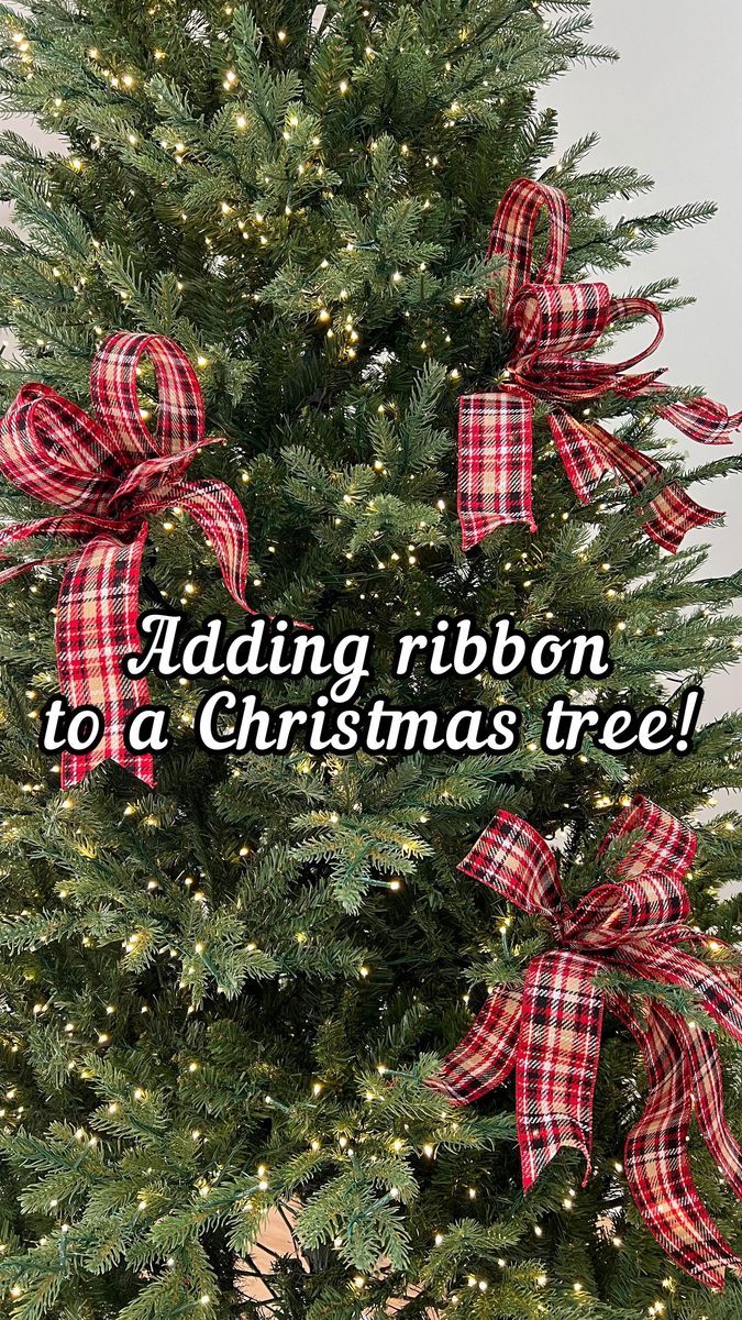 a christmas tree with red and white bows on it's branches that says adding ribbon to a christmas tree