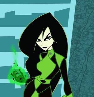 an animated image of a woman in green and black