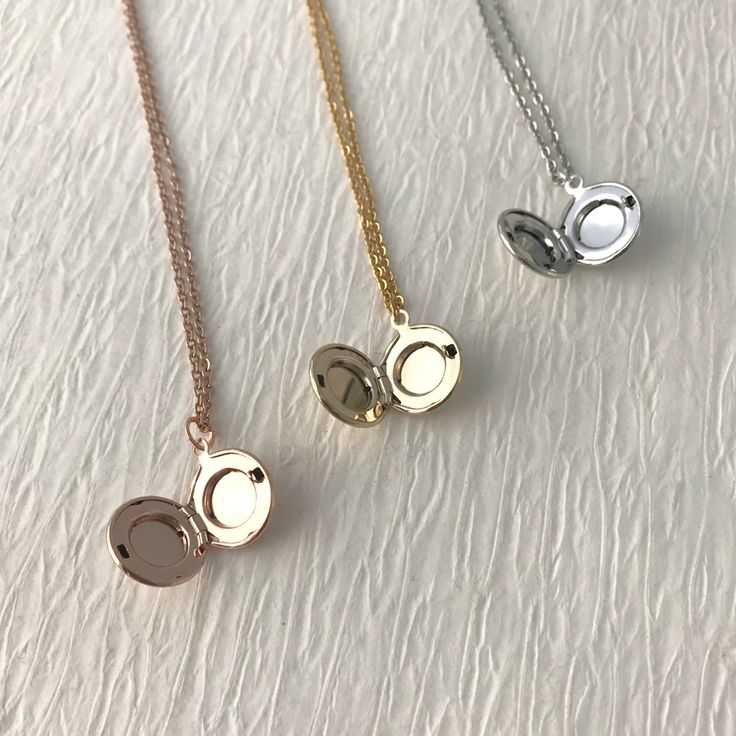 Nickel-free Charm Necklaces For Keepsake, Sterling Silver Rose Gold Locket Necklace, Rose Gold Sterling Silver Locket Necklace, Engraved Round Pendant Locket Necklace As Gift For Her, Dainty Round Pendant Locket Necklace With Adjustable Chain, Dainty Locket Necklace With Adjustable Chain, Engraved Rose Gold Locket Necklace With Round Pendant, Dainty Rose Gold Locket Necklace For Anniversary, Engraved Rose Gold Round Pendant Locket Necklace