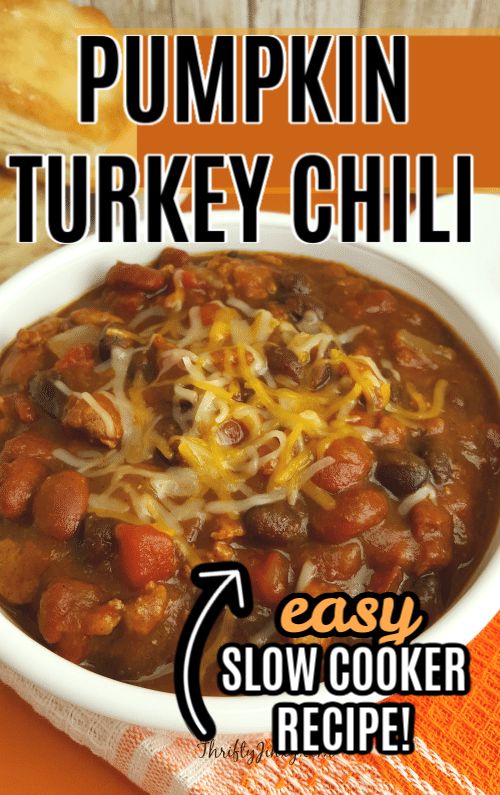 the recipe for pumpkin turkey chili is in a white bowl on an orange tablecloth