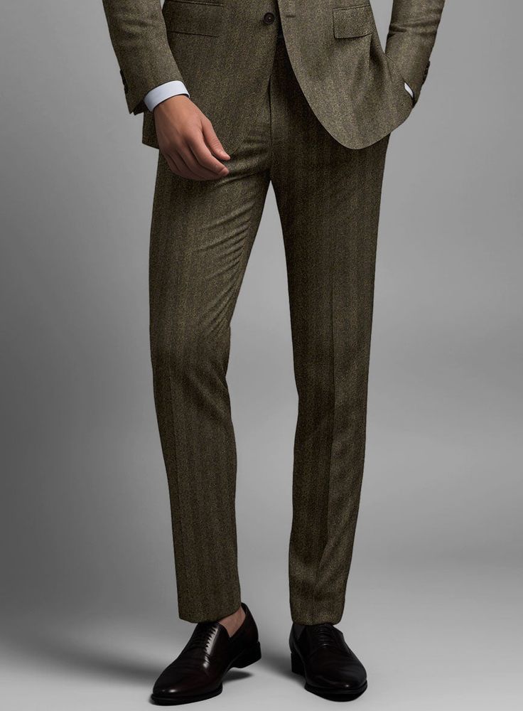 Embrace your wardrobe with our Italian Rust Herringbone Flannel Suit - the perfect choice for any occasion, whether it be a formal event or a high-profile business meeting. Made with premium wool and featuring a bold and distinguished herringbone pattern, this suit will add a touch of sophistication to your style. The soft and sumptuous texture, coupled with the charming rust shade, will make you stand out in comfort and class. Embrace exquisite taste with this captivating suit that will surely catch the eye of any fashion connoisseur.  Look features a 2 button jacket with notch lapels,  horn brown  buttons, single vent, three cuff buttons and two welted back pockets on trousers.   Click 'Customize Now' to modify the look if needed.       Lining: Viscose. Semi-formal Fall Herringbone Suit, Semi-formal Fall Suits With Herringbone Pattern, Tailored Herringbone Pattern Suits, Formal Brown Herringbone Pattern Suit, Brown Wool Suit With Herringbone Pattern, Flannel Suit, Master Tailor, Flannel Pants, Custom Tailoring