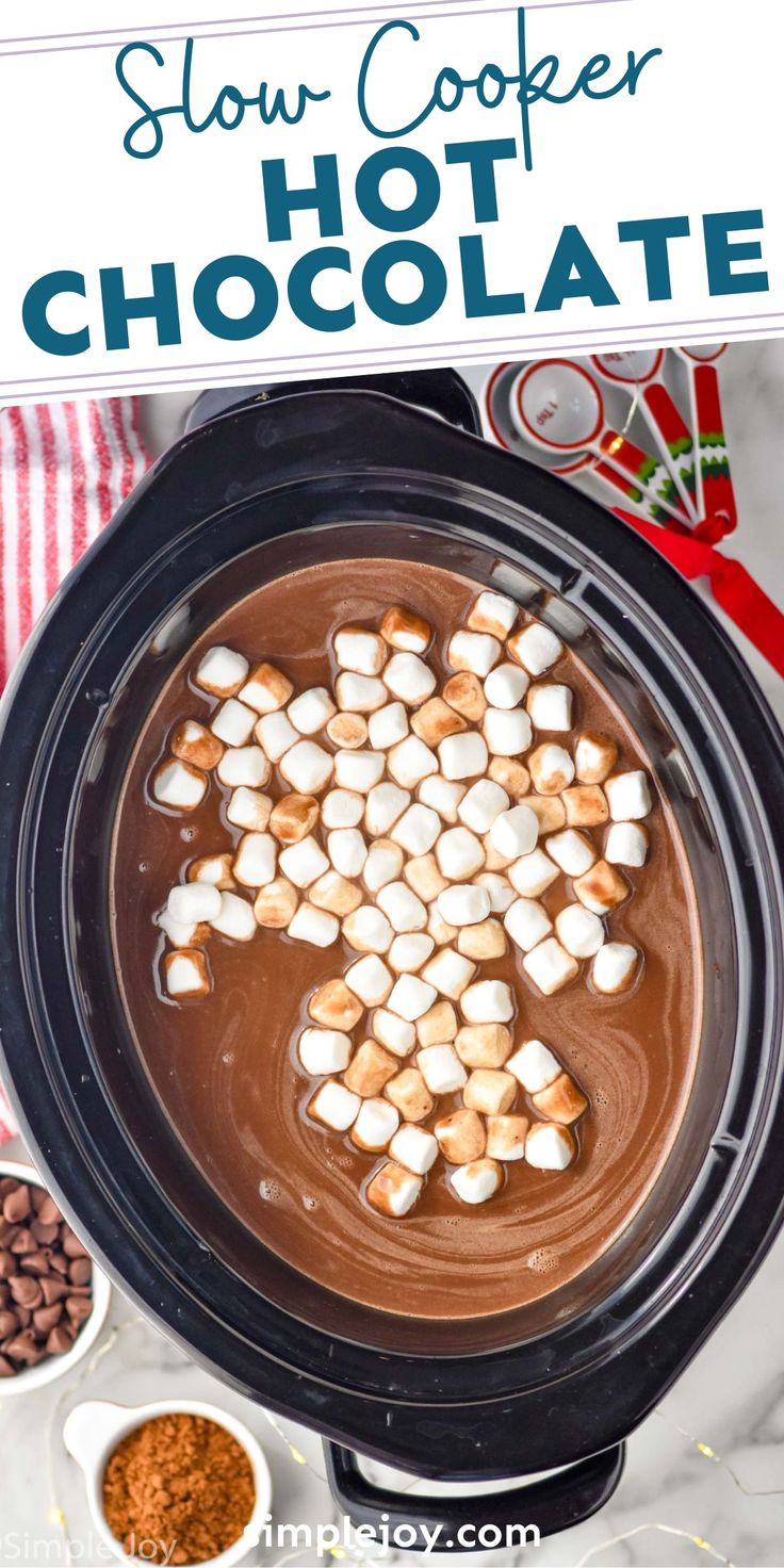 slow cooker hot chocolate with marshmallows in the center and on top