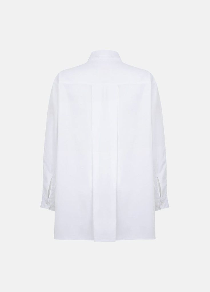 White button-down shirt Terza expertly blends classic and casual styles. You can effortlessly transition this model from a traditional long-sleeved white shirt to a more laid-back version by rolling up the sleeves. Its versatile design encourages you to experiment with your appearance, whether you choose to tuck Terza into your favorite pair of pants or a skirt. Crafted from organic cotton, Terza envelops you in the comfort of top-quality organic fabric. Embrace the freedom of comfort and confid Classic Long Sleeve Tops For Daywear, White Spread Collar Blouse For Fall, Timeless White Button-up Blouse, Timeless White Workwear Tops, Timeless White Tops For Workwear, Timeless White Tops For Work, Classic White Blouse With Fold-down Collar, Classic White Blouse With Fold Down Collar, Classic Long Sleeve Blouse With Roll-up Sleeves