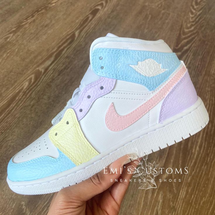 ♡ 100% authentic, hand-painted custom air force 1 lows with crackproof, waterproof coating ♡ New with original box ♡ Fun and cute pink, blue, purple, and yellow blocking with hot pink swoosh         ☆ Color customization available ♡ Size may be converted to youth/mens if applicable (Message me if you need a size not listed) ♡ Made to order; allow 1-2 weeks for processing! ♡ All final sale, no returns or exchanges Pastel Air Jordans, Pastel Jordans, Pink And Purple Air Jordans, Casual Mid-top Pink Custom Sneakers, Air Jordan 1 Mid Gs Pastel, Pastel Custom Sneakers For Streetwear, Mid Sneakers, Nike Air Jordan 1 Mid, Purple Pastel