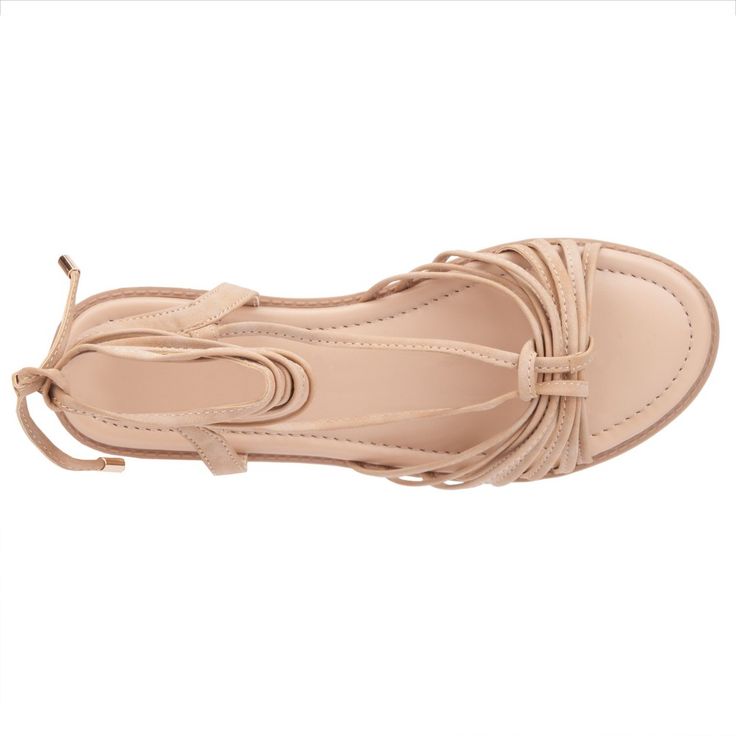 Discover the perfect blend of style and comfort with the Daria sandal. Intricately woven faux leather straps provide stylish support, complemented by a chic wrap around ankle strap for a secure fit. The round toe shape adds a sophisticated touch, making it ideal for any warm weather occasion. The Daria sandal effortlessly enhances your look, ensuring you stay fashionable and comfortable all day long. Elevate your wardrobe with this versatile design! Beige Strappy Lace-up Sandals For Spring, Chic Adjustable Lace-up Synthetic Sandals, Adjustable Open Toe Lace-up Sandals In Synthetic, Beige Strappy Lace-up Sandals For Vacation, Adjustable Open Toe Synthetic Lace-up Sandals, Adjustable Strappy Wedge Sandals For Vacation, Beige Adjustable Ankle Strap Wedge Sandals, Adjustable T-strap Sandals With Heel Strap For Spring, Adjustable Strappy Heels For Vacation