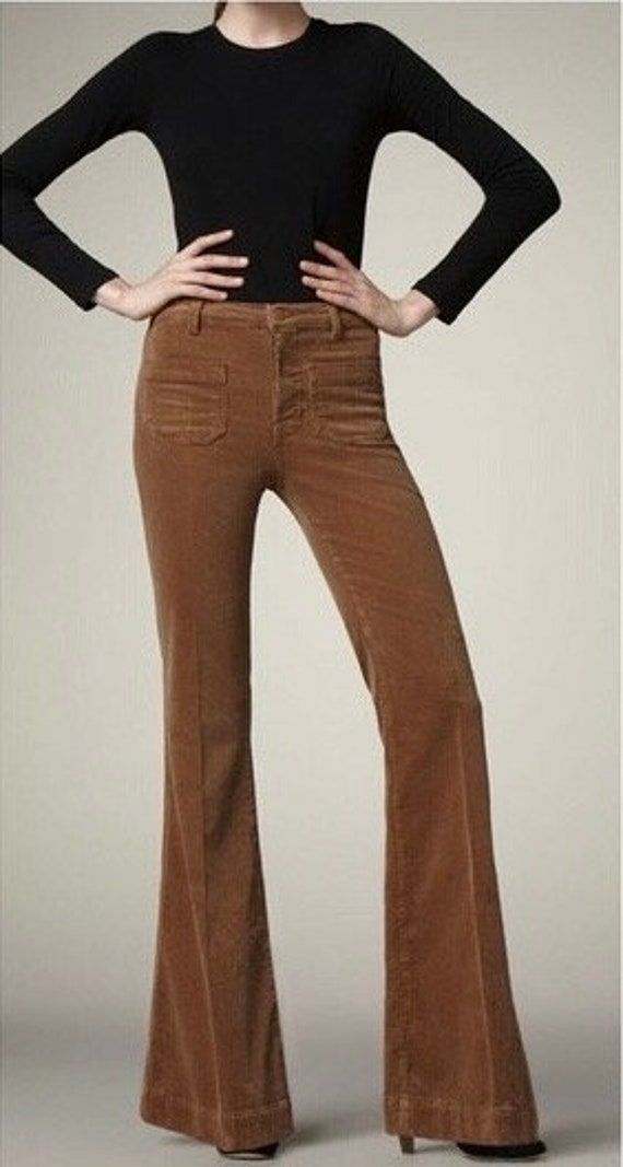 Y2K J Brand high rise, bell bottom flare leg toffee colored velvet corduroy trousers / pants.  Super cute, square front pockets, gradual flare bell bottom leg. Brilliant retro design inspired by the uber cool bellbottom style pants of the 1960s and 1970s  Incredibly comfortable, amazingly flattering, and an awesome toffee color. Brand: J Brand  Style: #1266F217 Wide-Leg Corduroy Pants  Size: 26  Color: Toffee  Material: 98% Cotton, 2% Spandex  Features: Zip & Button Closure, High Rise, 4 Pockets Courdory Pants Levis, Fitted Full Length Brown Flare Jeans, Fitted Flare Corduroy Pants, Vintage Straight Leg Flares For Fall, Fitted Brown Flare Jeans, 70s Inspired Brown Bottoms For Fall, Vintage Full Length Flares For Fall, Retro Mid-rise Brown Bottoms, Retro Brown Mid-rise Bottoms