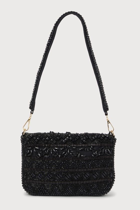 Everyone is sure to be mesmerized by your sense of style with the cute addition of the Lulus Captivating Aura Black Beaded Shoulder Bag! This stunning shoulder bag is covered with shiny beaded details (in varying shapes and sizes) that create a multitude of designs allover the rectangular silhouette. The front flap boasts a hidden magnetic closure that opens to reveal a roomy, lined interior with a sidewall pocket. Remove the detachable beaded shoulder strap when you want to style this bag as a Beaded Evening Shoulder Bag, Chic Beaded Shoulder Bag For Party, Embellished Black Evening Shoulder Bag, Beaded Shoulder Evening Bag, Beaded Evening Crossbody Bag, Evening Beaded Crossbody Bag, Beaded Crossbody Shoulder Bag For Evening, Beaded Crossbody Shoulder Bag For Party, Beaded Crossbody Evening Bag For Party