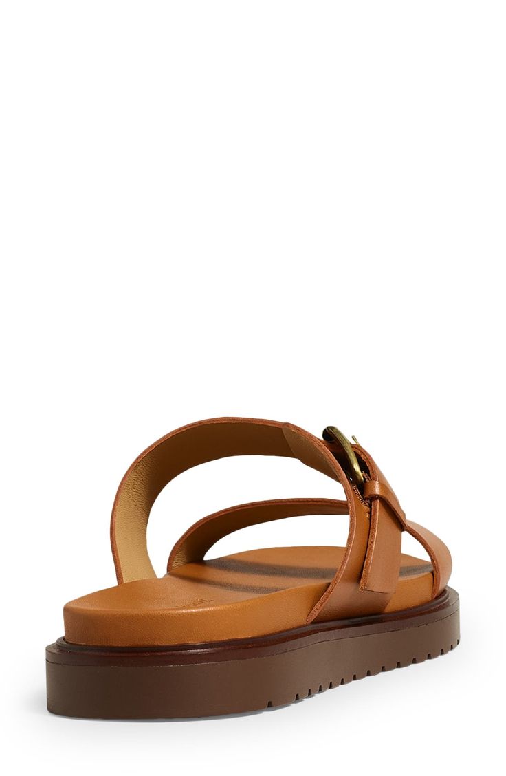 Complete your casual look with the effortless sophistication of this sleek two-strap sandal. Adjustable strap with buckle closure Leather upper and lining/synthetic sole Imported Casual Leather Slides With Tang Buckle, Classic Flat Slides With Buckle Closure, Leather Double Strap Slides With Buckle Closure, Classic Summer Slides With Adjustable Strap, Classic Slides With Adjustable Strap For Summer, Classic Open Toe Footbed Sandals With Tang Buckle, Modern Brown Sandals With Buckle Closure, Classic Slide Sandals With Buckle Closure, Double Strap Slides With Tang Buckle For Beach