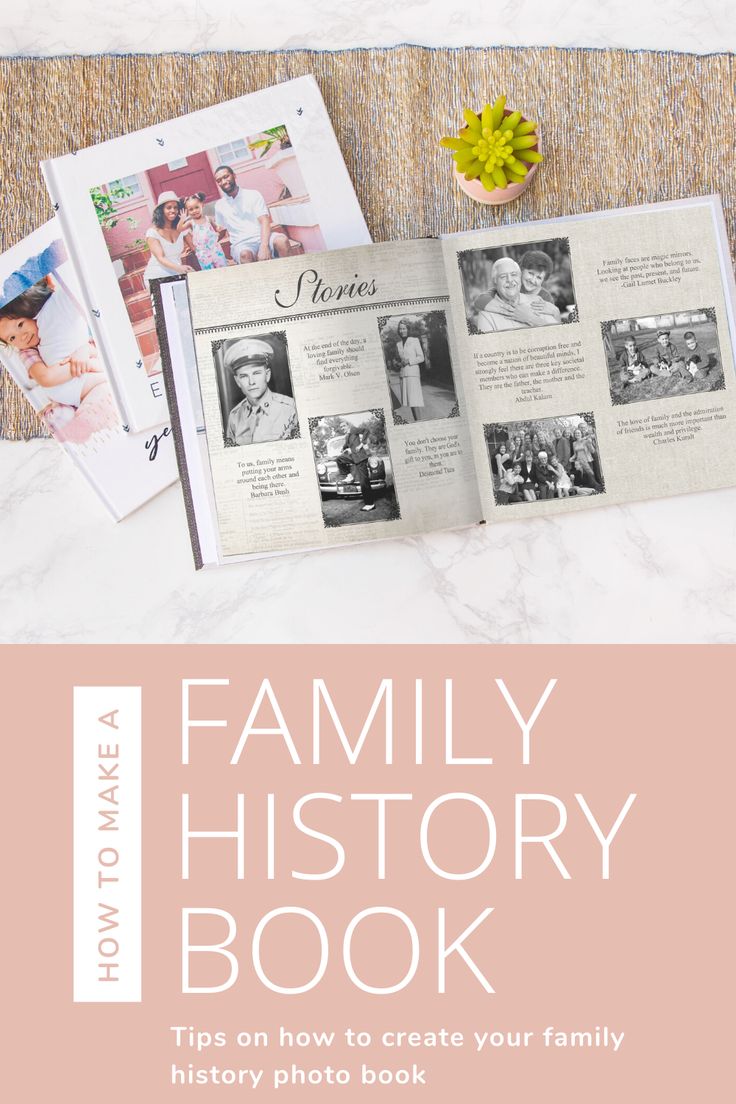 the family history book is open on a table with flowers and photos in front of it