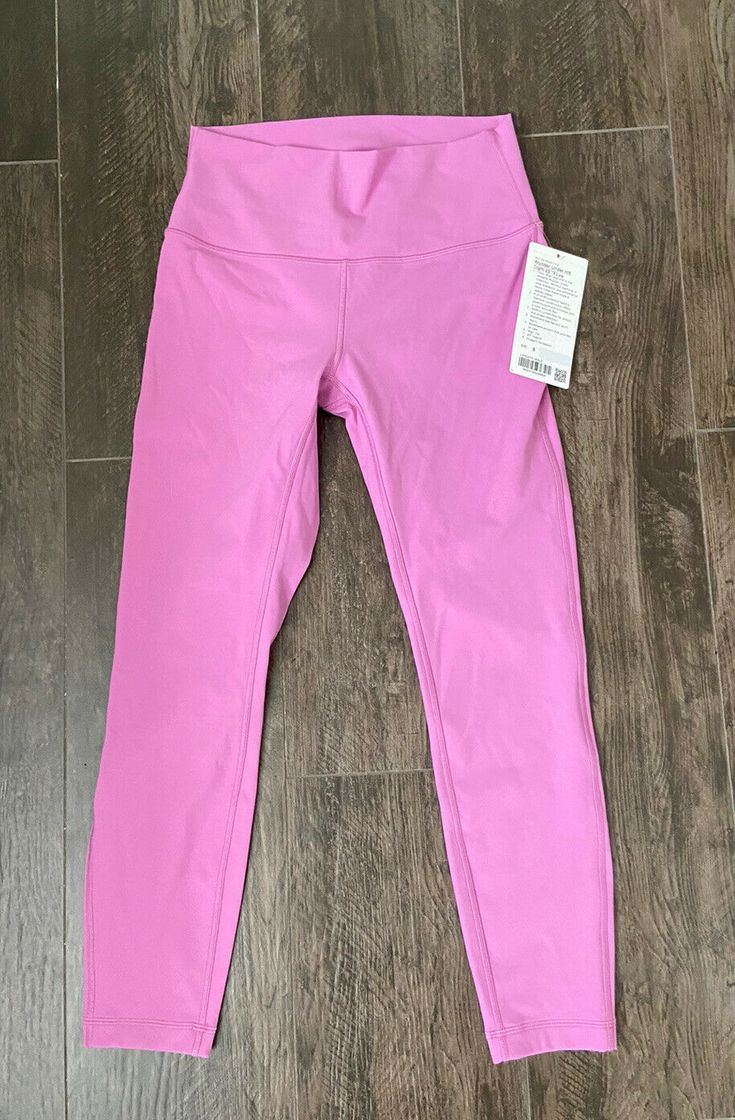 Lululemon Wunder Under HR Tight 25” MGLO Magenta Glow 29869 Size 8 NWT. Designed for: Yoga Hugged sensation: Engineered to feel like a comfortable embrace throughout—it holds you close and moves with you Hidden card pocket : Hidden pocket in waistband holds your key or card No-dig waistband: Soft, no-dig waistband lies flat against your skin High-rise: Keeps you feeling covered and secure Full-on Luxtreme fabric Inseam: 25" Comes from smoke free home. All sales are final so please ask all questi Pink Casual Activewear By Lululemon, Pink Functional Lululemon Activewear, Pink Functional Activewear By Lululemon, Pink Lululemon Athleisure Activewear, Pink Lululemon Activewear For Workout, Pink Lululemon Activewear For Yoga, Lululemon Pink Athleisure Activewear, Lululemon Pink Activewear For Pilates, Lululemon Pink Activewear For Training