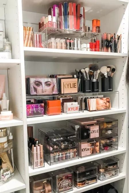 the shelves are filled with various cosmetics and makeup products