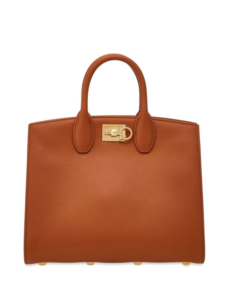 cognac brown calf leather pebbled texture Gancini plaque logo-engraved gold-tone hardware two rolled top handles adjustable detachable shoulder strap push-lock fastening main compartment debossed internal logo multiple internal slip pockets metal feet Chanel 2, Flat Boots, Ballet Flat Shoes, Heel Boots, Clothing Ideas, High Heel Boots, Sandals Summer, Leather Tote Bag, Salvatore Ferragamo