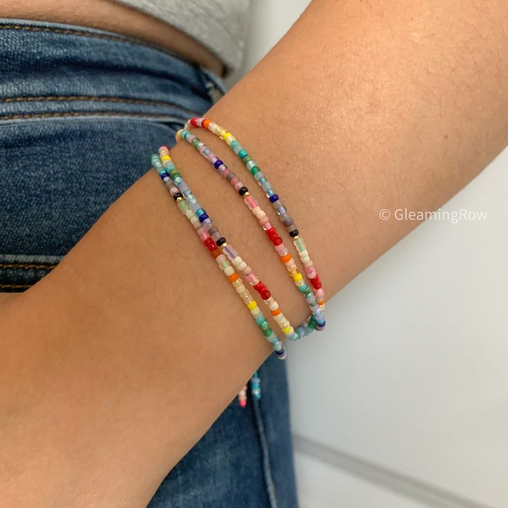 Bright colorful seed bead boho bracelet for women, Dainty multicolored stacking bracelet, handmade beach gift for her ◽️ S I Z E ∙ G U I D E ◽️   All bracelets in shop are adjustable, which can fit for most wrist size. ◽️ P A C K A G I N G ∙ R E C E I P T S ◽️  * All items are nicely packaged ready to gift in elegant jewelry boxes. * As so many of our orders are gifts, I do not include receipts in any of our packaging. Receipts can be found under your purchases on Etsy. ◽️ U P G R A D E ∙ P A C K A G I N G ◽️  * Our default packaging is gift-ready. You can also upgrade it to premium gift wrapping by clicking 「 Mark order as a gift 」 when check out. ◽️ T U R N ∙ A R O U N D ∙ T I M E ◽️   * All items purchased will be shipped within 5 business days. ◽️ D O M E S T I C ∙ S H I P P I N G ∙ T Bracelet Stack Boho, Bohemian Multicolor Friendship Bracelets For Everyday, Bohemian Multicolor Friendship Bracelets, Everyday Multicolor Bohemian Friendship Bracelets, Bohemian Multicolor Friendship Bracelets With Spacer Beads, Bohemian Multicolor Wrap Bracelet For Everyday, Handmade Colorful Friendship Bracelets, Multicolor Beaded Friendship Wrap Bracelet, Dainty Tiny Beads Bracelets For Beach