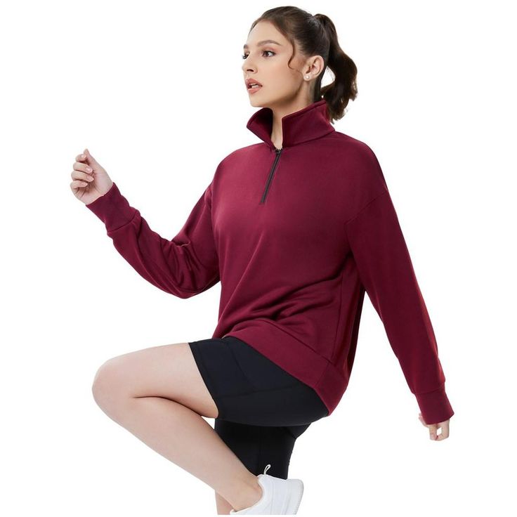 Stay cozy and stylish this fall and winter with our Cotton and Polyester blend half zip pullover for women. This oversized hoodie features a quarter zipper and drop shoulder collar for an effortlessly chic look. Perfect for fall and winter fashion, this long sleeve sweater is a versatile piece that can be easily styled with pants, jeans, or joggers. Whether you're heading to the office, a casual outing, or a workout session, this pullover sweatshirt will keep you warm and on-trend. Elevate your Sporty Half-zip Sweater, Half-zip Sportswear Sweatshirt For Fall, Sporty Half-zip Sweatshirt For Winter, Winter Sporty Half-zip Sweatshirt, Half-zip Sweatshirt For Sports In Fall, Oversized Fleece Hoodie With Half-zip, Oversized Fleece Half-zip Hoodie, Winter Half-zip Sweatshirt For Loungewear, Winter Half-zip Sportswear Sweatshirt