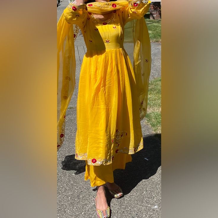 Really Nice Material Pure Crepe With Hand Work Like Brand New Wore It During Pregnancy Around House Without Heels Or Jewelry But It Is Really Nice Suit For Haldi Function.Side Zipper For Easy Wearing Breast-17��” Length-44 Margin Of 1 Inch On Each Side With Extra Sean Festive Yellow Straight Kurta Lawn Suit, Festive Yellow Lawn Suit With Straight Kurta, Yellow Lawn Suit With Zari Work Straight Kurta, Designer Yellow Lawn Suit With Traditional Drape, Yellow Chanderi Lawn Suit For Navratri, Yellow Lawn Suit With Traditional Drape For Navratri, Festive Yellow Lawn Suit For Diwali, Festive Diwali Yellow Lawn Suit, Festive Yellow Palazzo Set With Straight Kurta