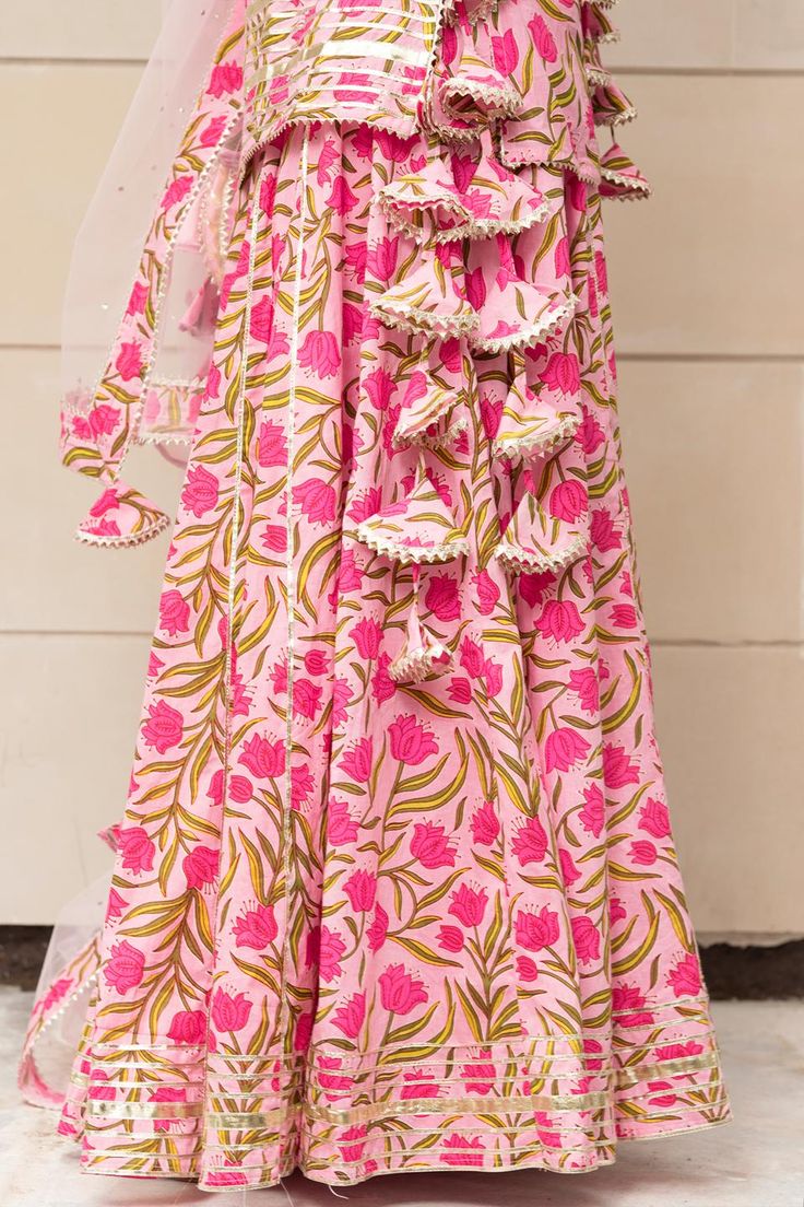 Tulsi Pink Cotton Hand Block Skirt Set online in USA | Free Shipping , Easy Returns - Fledgling Wings Cotton Sharara With Sheer Dupatta For Festivals, Traditional Cotton Sharara With Floral Print, Cotton Floral Print Sharara For Navratri, Designer Cotton Sharara With Floral Print, Festive Cotton Sharara With Floral Print, Festive Cotton Lehenga With Printed Motifs, Festive Cotton Floral Print Sharara, Bohemian Mulmul Anarkali Set With Floral Print, Bohemian Floral Print Sets In Mulmul