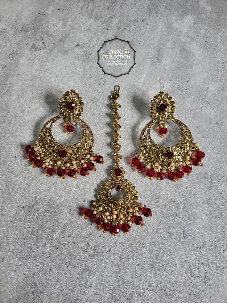 We are thrilled to introduce our exquisite collection of Indian earrings in Maroon color. These stunning earrings are crafted to enhance your style, whether you're attending a party or a wedding ceremony. They are guaranteed to make you stand out in the crowd.Elevate your style with these stunning Earrings. Make a bold fashion statement and turn heads wherever you go. Shop our stunning collection today!We have a wide range of colors available, so be sure to check our other listings to find the perfect match for your style. In addition to this earring, we have a wide variety of Indian Pakistani jewelry. Explore our shop to discover the perfect piece for your collection. If you're having trouble viewing our photos, try increasing your screen brightness for a clearer image.We aim to dispatch Red Gold Plated Earrings For Festivals, Maroon Earrings Indian, Luxury Red Bollywood Earrings, Red Meenakari Elegant Jhumkas, Maroon Earrings, Festive Red Meenakari Chandelier Earrings, Earrings Indian, Pakistani Jewelry, Indian Earrings