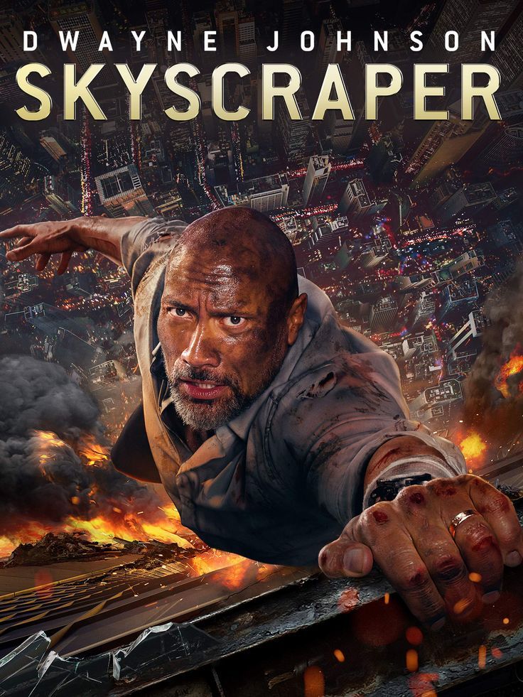 the movie sky scraper is shown in front of a cityscape with flames