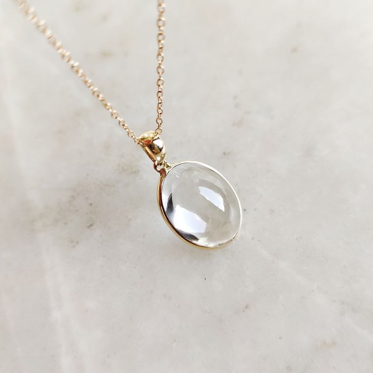 This stunning Pendant is set in 14k Solid Yellow Gold with Natural Clear Quartz with utmost precision. It is a unique gemstone Pendant for nearly every occasion and is completely hassle-free jewelry. ITEM DETAILS: * GEM: Clear Quartz * GEM SIZE: 12X16mm * GEM SHAPE: Oval * GEM WEIGHT: 10.60 carats * Gold Purity: 14KT * Gold Weight: 0.60 gram * Total Weight: 2.72 gram The Gold purity is guaranteed and it comes with authentic 14KT gold hallmark. Since my items are handmade, they are absolutely nickel and lead free. CUSTOMIZATION: * Gemstone customization is available and it can be substituted with a gem of your choice. Kindly message me for the same. PACKAGING * The Pendant comes with layers of safe and secure wrapping along with Free handmade jewelry box with every purchase. ➡️Head to these 14k Gold Teardrop Jewelry With Bezel Setting, Timeless Teardrop Bezel Set Jewelry, 14k Gold Briolette Gemstones For Gift, Exquisite Rose Cut Diamonds Jewelry Gift, White Gold Rose Cut Diamonds Jewelry For Gift, Timeless Faceted Jewelry For Gift, Elegant Bezel Set Gemstones For Anniversary, 14k White Gold Gemstones As Gift, Formal Teardrop Bezel Set Jewelry