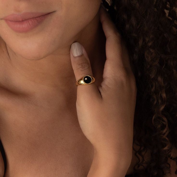 This modern signet ring is sure to get noticed with its bold design and stunning black color. The deep black background and thick ring band is an elegant contrast to the delicately embedded CZ Diamond. It’s both elegant and edgy, making it perfect for any occasion or style. Material: High Quality Solid 925 Sterling Silver Finish: 18K Gold∙Sterling Silver Featuring a ~10mm Black Enamel Signet Ring with an embedded CZ Diamond | Band is ~2.5mm Model showcases a statement, everyday style ring look f Black Signet Ring, Thick Ring, Emerald Necklace, Oval Rings, Domed Ring, Ring Sizer, Deep Black, Cz Diamond, Ring Band