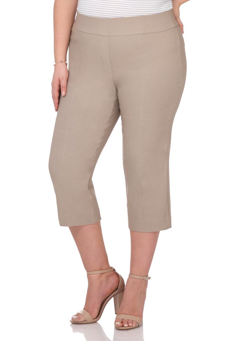 You love summer and the feel of fresh breeze, but wonder if you will ever find summer pants that fit as good as they look? These pull-on capri are just for you. Slip in them with ease to flaunt your unique style on both summer decks and office desks. Their extra stretch and wide waistband will keep you going for long hours, making them the perfect base to match with any of your tops. 360 degree wide elastic waistband Soft twill fabric Tummy control panel Metal logo tab on the back Mid-rise, sits Summer Deck, Office Desks, Summer Pants, Long Hours, Metal Logo, Control Panel, Twill Fabric, Wide Waistband, Metallic Logo