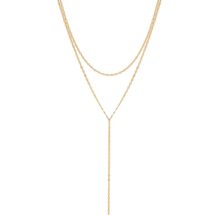 The Eliana Lariat Necklace is designed to complement a variety of necklines and styles, this lariat is perfect for both casual and formal occasions. Wear it with a plunging neckline for a dramatic effect, or layer it with other necklaces for a chic, contemporary look. 14k gold-filled 16"-18" adjustable length Nickel and lead-free FINAL SALE Elegant Double Strand Backdrop Necklace With Delicate Chain, Elegant Layered Necklace With Adjustable Double Chain, Elegant Adjustable Dangle Layered Necklace, Elegant Double Chain Adjustable Body Chain, Double Chain Lariat Necklace, Elegant Adjustable Double Chain Necklaces, Elegant Adjustable Double Chain Body Chain, Elegant Lariat Necklace For Formal Occasions, Elegant Adjustable Chain Backdrop Necklace