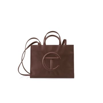 The iconic Unisex TELFAR Shopping Bag is an Everyday bag for Everyone. Telfar Shopping Bag, Medium Chocolate Brown, Chocolate Shop, Logo A, Survival Kit, Everyday Bag, Embossed Logo, Chocolate Brown, Drawstring Bag