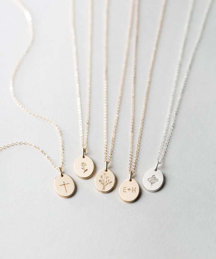 "Custom Personalized Small Oval Necklace. Makes a great gift with initials or symbols! Choose up to three small oval pendants to personalize with your fave initials or symbols. D I A N A ∙ S M A L L ∙ O V A L ∙ N E C K L A C E D E T A I L S * 100% 14k Gold Filled, Sterling Silver, or 14k Rose Gold Filled * All raw materials are USA sourced * The Small Oval is approx 9x13mm These ovals are also available in another size! * Tiny version of this piece: https://www.etsy.com/listing/616325794 I T ' S Minimalist Oval Pendant Necklaces For Mother's Day, Minimalist Oval Pendant Necklace For Mother's Day, Rose Gold Oval Pendant Necklace With Charms, Dainty Rose Gold Oval Necklace, Rose Gold Oval Necklaces With Charms, Minimalist Oval Rose Gold Necklace, Dainty Oval Rose Gold Necklace, Rose Gold Oval Charms Necklace, Oval Rose Gold Necklaces With Charms