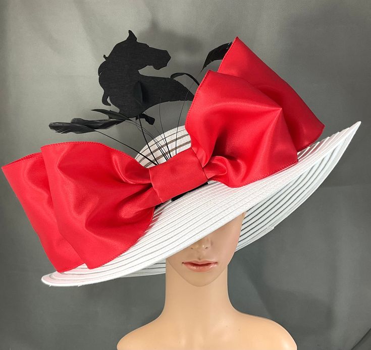 Gorgeous Kentucky Derby Hat   Ready to ship  100% Brand New  Designed & Made in USA         This gorgeous hat has a 22.5 inches interior crown circumference.The Brim is 5 3/4 inches. It fits most! Hat Base Color: White  Bow color: Red ( about 13 inches in width) Handmade Felt Horse : Black (6 inches in height) with millinery wire  Feather color: Black  Hat band: Black  This is a high quality wide brim hat with wire which could hold it's shape.It won't flop in the eyes and face. Would be great fo Luxury Red Fedora For Kentucky Derby, Luxury Red Hat For Kentucky Derby, Luxury Red Hat Bands For Kentucky Derby, Top Hat For Kentucky Derby And Country Events, Classic Kentucky Derby Hat With Structured Crown, Pinched Crown Hat For Church And Kentucky Derby, Red Brimmed Hat For Church, Red Brimmed Church Hat, Red Short Brim Hats For Church