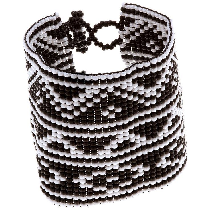 Black and white goes beautifully with everything, no matter where your wanderlust takes you. Trendy and tribal-inspired, this bracelet is perfect for pairing with summer whites or denim for a great boho look, and made by women bead artisans of La Casa in Guatemala. Since 2000, La Casa Cotzal has designed a range of Guatemalan handcrafted produced by artisan communities throughout the country. Artisans at La Casa are versed in both weaving techniques as well as in intricate bead work. The work pr Save The Rainforest, Paw Print Jewelry, Spirit Clothing, Fair Trade Clothing, Ribbon Jewelry, The Rainforest, Printed Jewelry, Gender Equality, Beaded Cuff