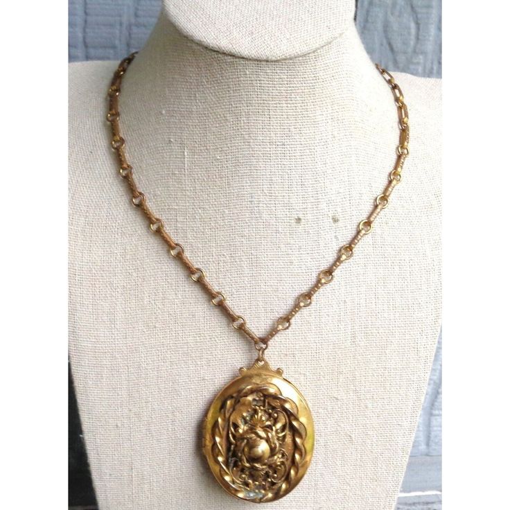 "For your consideration is a beautiful necklace that appears to be from the Art Nouveau era. I'm not sure on the exact date. There may be a date behind the photos but I did not want to take them out & damage them.  There is a lot of detail, especially at the front of the locket. The chain is approx. 19\" long & the locket portion is approx. 2.5\" from the very top to the bottom & x approx. 1-3/4\" wide.  I am unsure what type of metal this is but I do not see any markings. The chain does not sti Vintage Oval Pendant Necklaces With 17 Jewels, Antique Oval Pendant Necklace For Wedding, Antique Oval Necklace For Vintage Events, Ornate Oval Pendant Necklace With Vintage Charm, Vintage Locket Necklace With Intricate Pendant Design, Victorian Large Pendant Necklace For Weddings, Vintage Jeweled Necklaces For Vintage Events, Vintage Medallion Costume Jewelry Necklace, Vintage Costume Jewelry Medallion Necklace